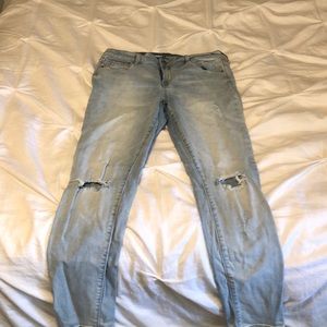 Light wash lightly ripped jeans